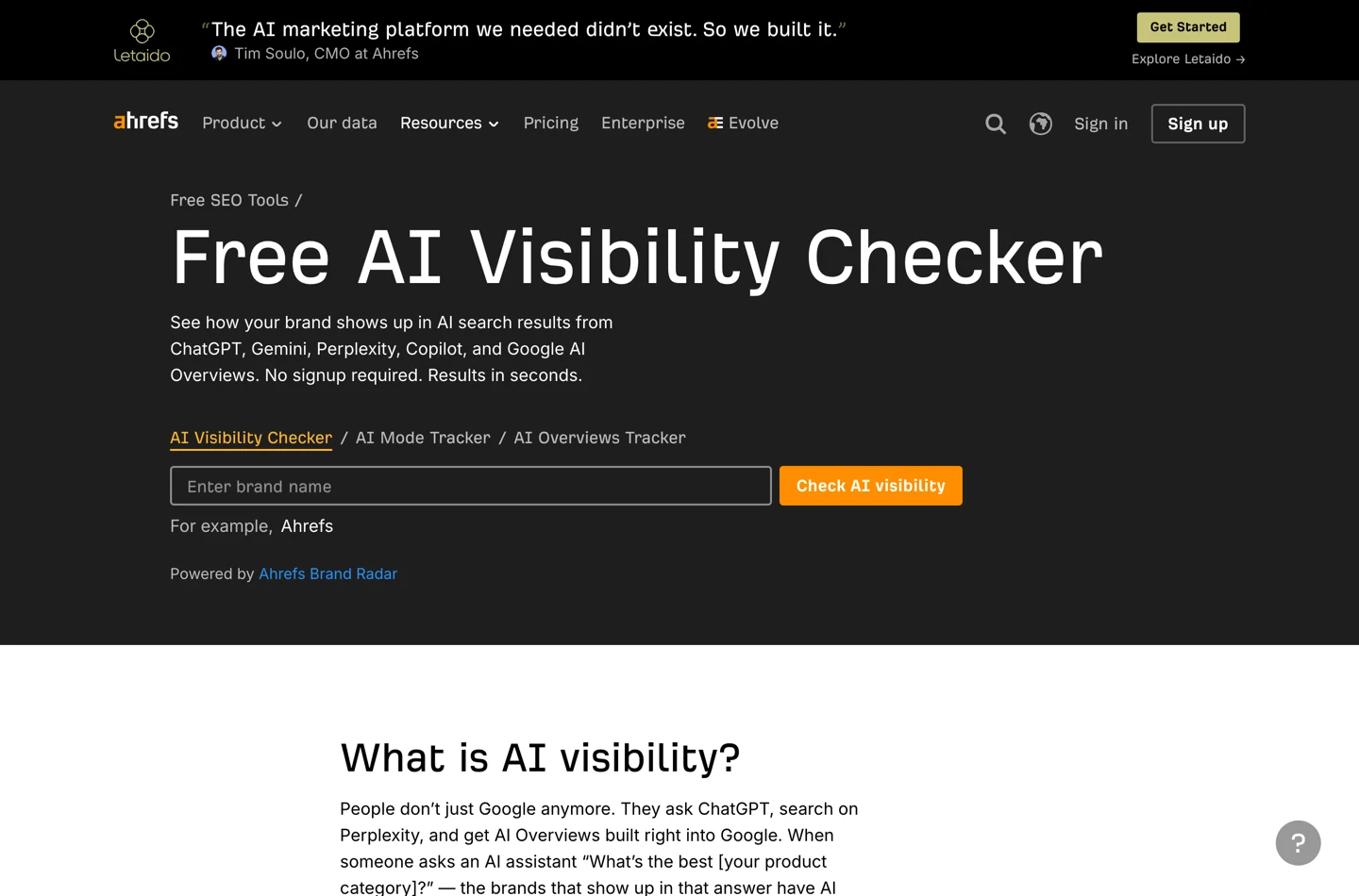 The Ahrefs Free AI Visibility Checker landing page, with an Enter brand name field, a Check AI visibility button, and the strapline No signup required, results in seconds.